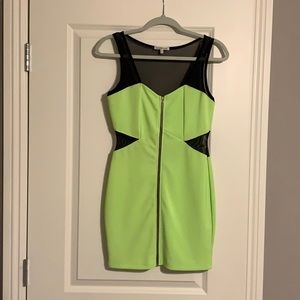 Neon green + black body con dress